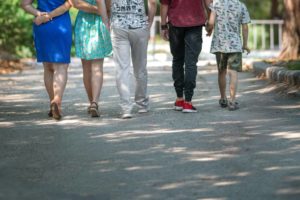 family walk to prevent varicose veins
