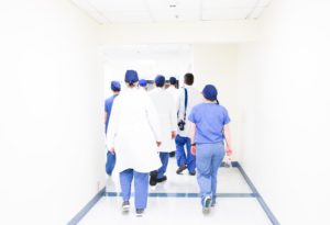 nurses and doctors in a hallway