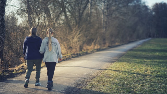 women taking a walk outside