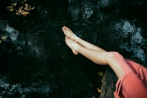 legs floating in the water