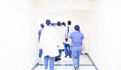nurses and doctors in a hallway